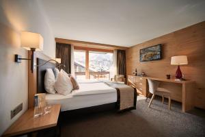 A bed or beds in a room at Hotel AMBiANCE