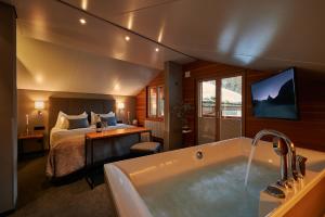 A bed or beds in a room at Hotel AMBiANCE