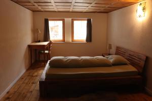 Postel nebo postele na pokoji v ubytování Ferienwohnung Unterdorf