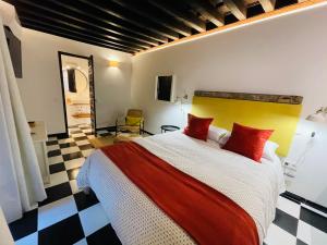 מיטה או מיטות בחדר ב-El cobertizo de Jimena y Candela - PARKING GRATIS
