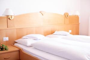 Postel nebo postele na pokoji v ubytování Garni-Hotel mir.es