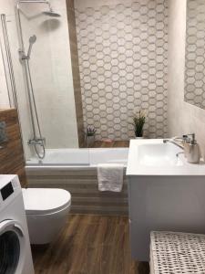 Łazienka w obiekcie Gdansk Apartament Harmonia Oliwska