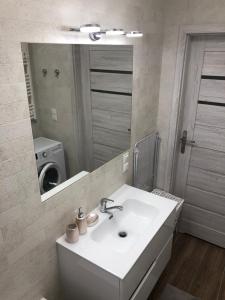 Łazienka w obiekcie Gdansk Apartament Harmonia Oliwska