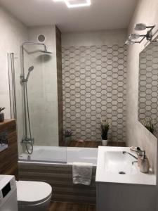 Łazienka w obiekcie Gdansk Apartament Harmonia Oliwska