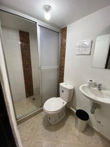 Koupelna v ubytování Hotel Policarpa