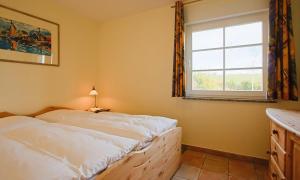 Postel nebo postele na pokoji v ubytování Am Paetowhof 3 4