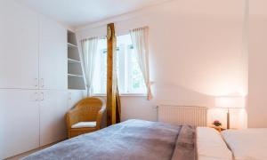 Postel nebo postele na pokoji v ubytování Villa Sonnenfrieden 01