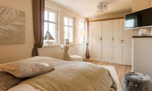 Postel nebo postele na pokoji v ubytování Sturmvogel