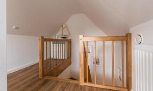 Ένα ή περισσότερα κρεβάτια σε δωμάτιο στο Wind & Segel