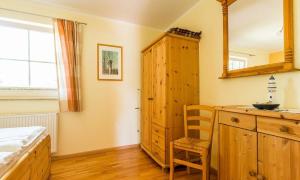 Postel nebo postele na pokoji v ubytování Darßer Smuggler Hus 2