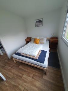Postel nebo postele na pokoji v ubytování Resort Marina Suchacz