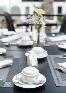 Restaurace v ubytování CySuites Apartment Hotel