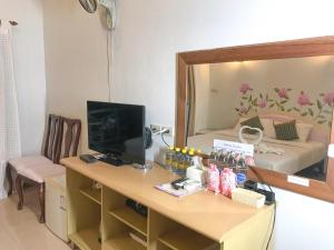 TV a/nebo společenská místnost v ubytování Phurua Bussaba Resort & Spa