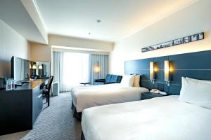 Postelja oz. postelje v sobi nastanitve Hotel Nikko Osaka