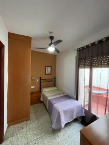 Ένα ή περισσότερα κρεβάτια σε δωμάτιο στο H Arkanta