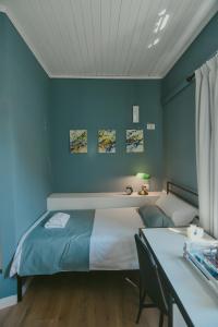 Łóżko lub łóżka w pokoju w obiekcie Atelier Boutique Hotel