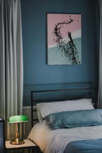Łóżko lub łóżka w pokoju w obiekcie Atelier Boutique Hotel