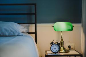 Łóżko lub łóżka w pokoju w obiekcie Atelier Boutique Hotel