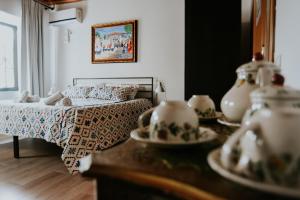 Łóżko lub łóżka w pokoju w obiekcie Atelier Boutique Hotel