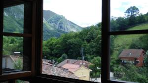 a view from a window of a village at Casa Rural Los Riegos in Caso