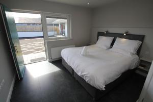 Postel nebo postele na pokoji v ubytování North Coast Motel + 28 fotografií