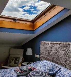 Postel nebo postele na pokoji v ubytování La Casa de la Luna
