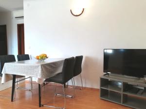 Telewizja i/lub zestaw kina domowego w obiekcie Apartment Toncic