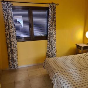 Posteľ alebo postele v izbe v ubytovaní Oasis Royal F217