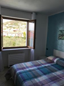 Postel nebo postele na pokoji v ubytování Borgo Piccolo