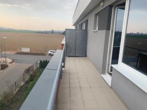 Balkón nebo terasa v ubytování Apartment IRON CUBE
