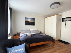 Letto o letti in una camera di Hotel Südstrand Amrum