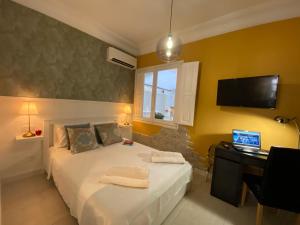 Postel nebo postele na pokoji v ubytování Apartment San Carlos Alicante