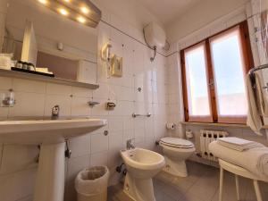 Koupelna v ubytování Hotel Da Graziano