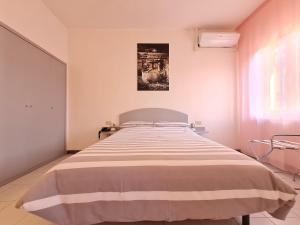 Postel nebo postele na pokoji v ubytování Hotel Da Graziano