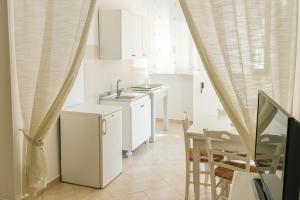 A kitchen or kitchenette at Terra D'Otranto