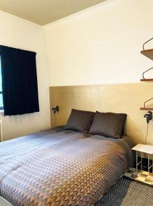 Postel nebo postele na pokoji v ubytování B&B Expo House