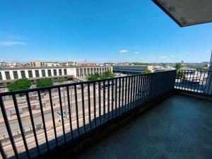a balcony with a view of a city at Tourism E Business Superior Rooms in Padova