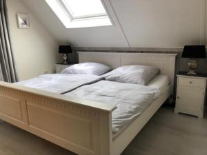 Katil atau katil-katil dalam bilik di Perle am Ijsselmeer mit eigenem Tretboot
