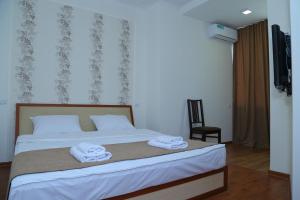 Postel nebo postele na pokoji v ubytování Merien Guesthouse 16 + 8 fotografií