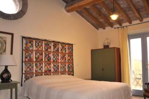 Posteľ alebo postele v izbe v ubytovaní montecristo country house