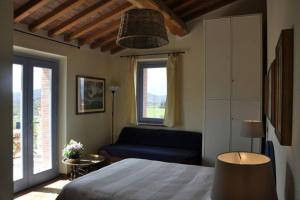 Posteľ alebo postele v izbe v ubytovaní montecristo country house