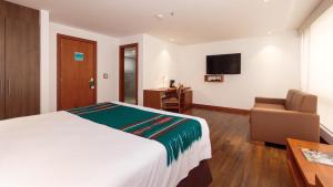 TV a/nebo společenská místnost v ubytování ZEN Hotel