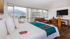 Postel nebo postele na pokoji v ubytování ZEN Hotel