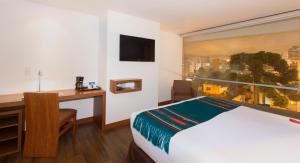 TV a/nebo společenská místnost v ubytování ZEN Hotel
