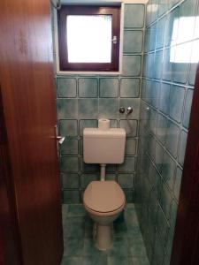 Kúpeľňa v ubytovaní Apartman Franelić Banjol