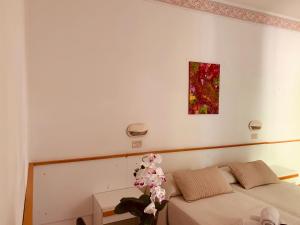 Postel nebo postele na pokoji v ubytování HOTEL LABRADOR