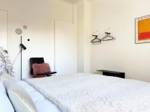 Postel nebo postele na pokoji v ubytování B&B Expo House