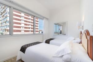 Postel nebo postele na pokoji v ubytování Hotel Romimar 3* Sup
