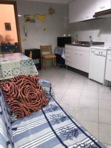 Una cocina o cocineta en Apartment La Conchiglia 33 fotos más