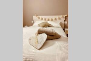 Postel nebo postele na pokoji v ubytování Mi Pequeña Buhardilla
